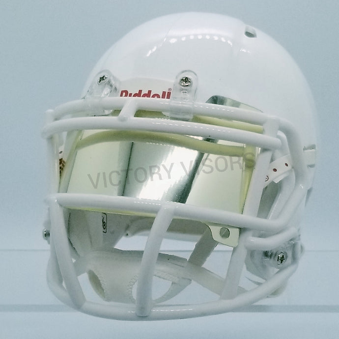 Light Gold Mini Football Helmet Visor from Victory Visors for football helmet memorabilia collectors and helmet breaks. Wholesale mini football helmet visors in the USA. Mini football helmet visor Houston, TX. Football helmet signatures.